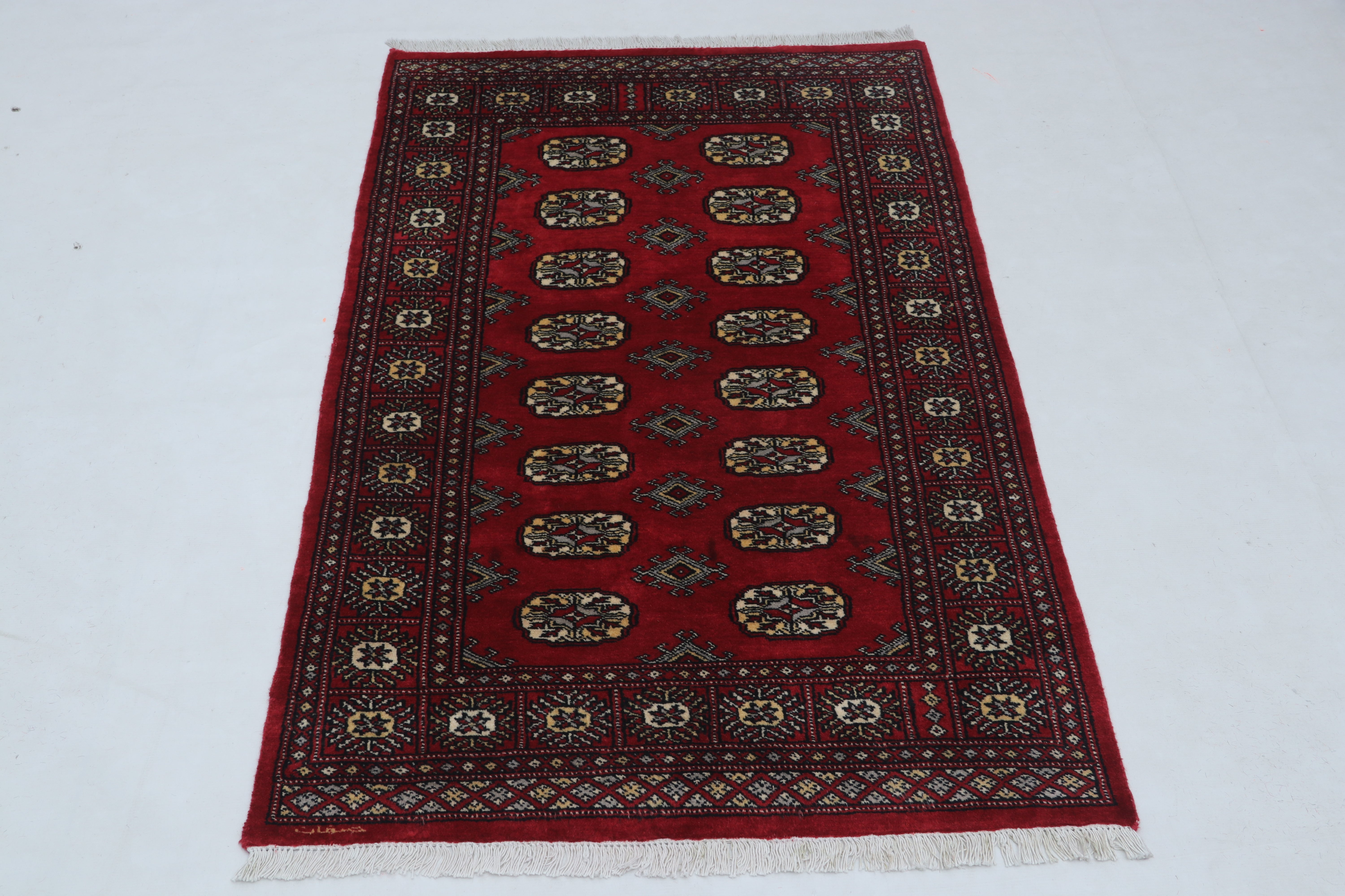 Hand-knotted Mori Bokhara cotton and wool rug in red