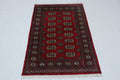 Hand-knotted Mori Bokhara cotton and wool rug in red