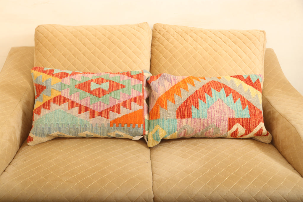 Luxury multicolor geometric wool rectangular cushion set of two for elegant sofa and bedroom décor.
