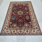 5.5x8 red Heriz floral handmade wool and cotton area rug with vegetable dyeing
