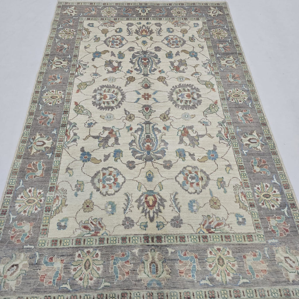 5x8 beige Chobi floral handmade wool and cotton area rug with vegetable dyeing