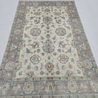 5x8 beige Chobi floral handmade wool and cotton area rug with vegetable dyeing