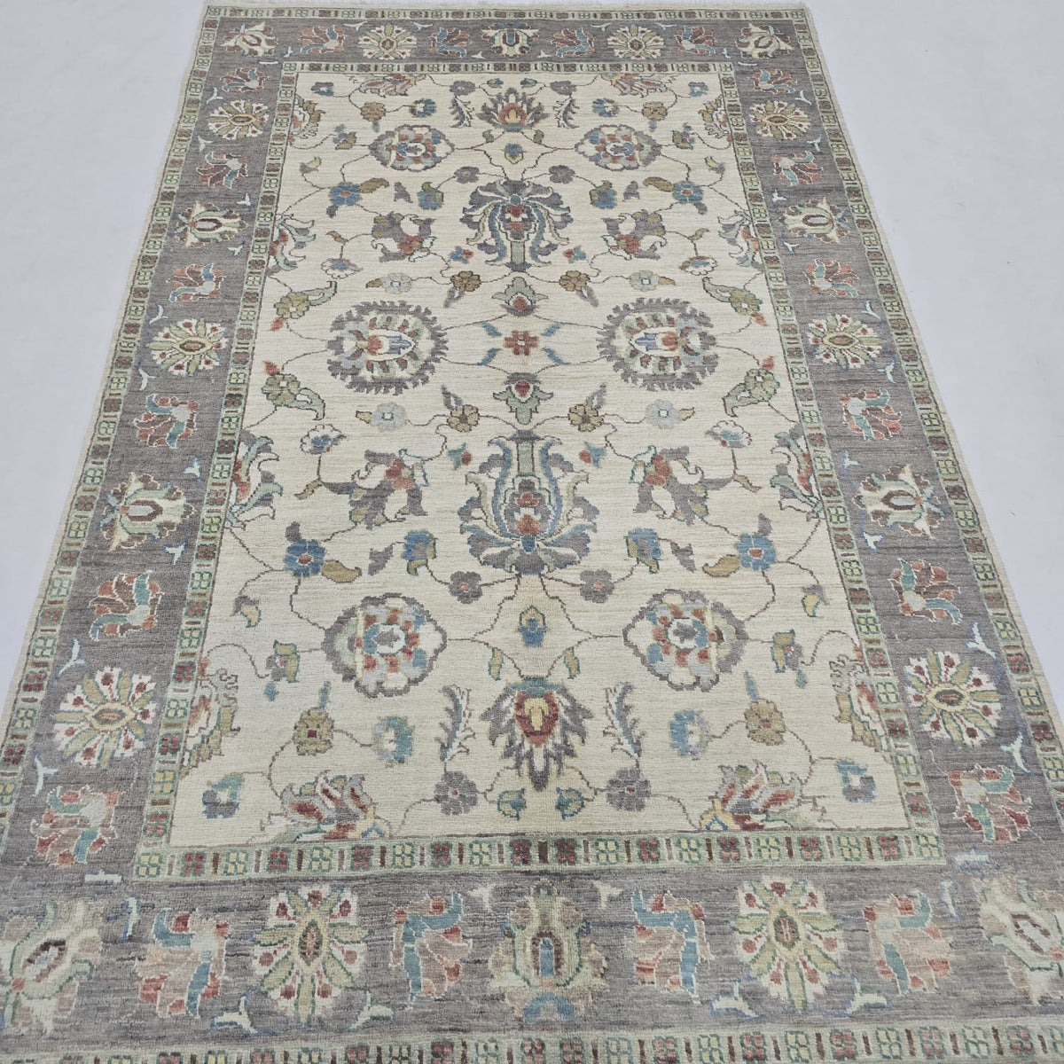 5x8 beige Chobi floral handmade wool and cotton area rug with vegetable dyeing