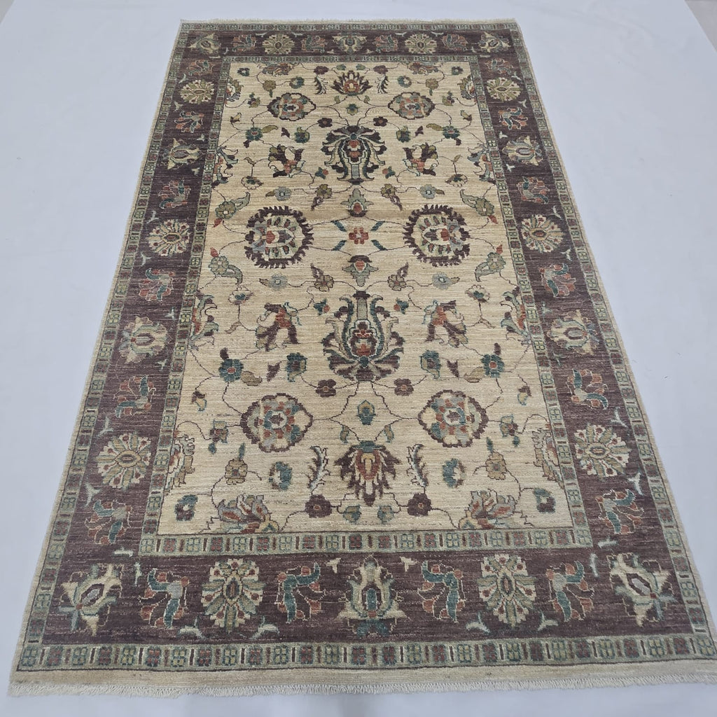 5x8 beige Chobi floral handmade wool and cotton area rug with vegetable dyeing