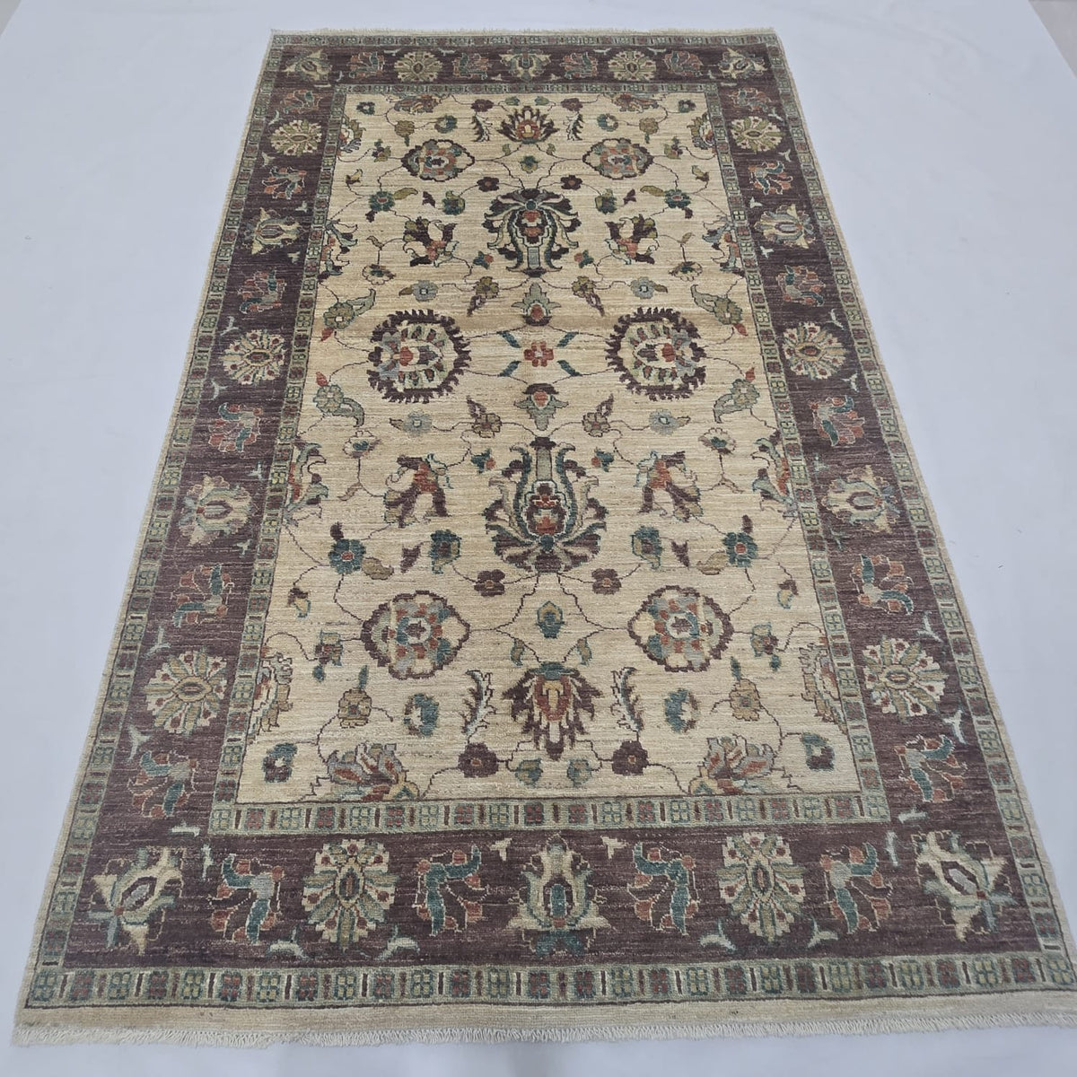 5x8 beige Chobi floral handmade wool and cotton area rug with vegetable dyeing