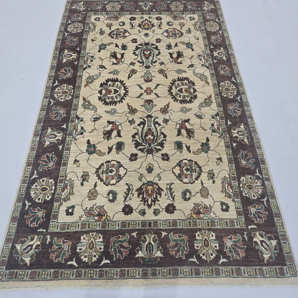 5x8 beige Chobi floral handmade wool and cotton area rug with vegetable dyeing