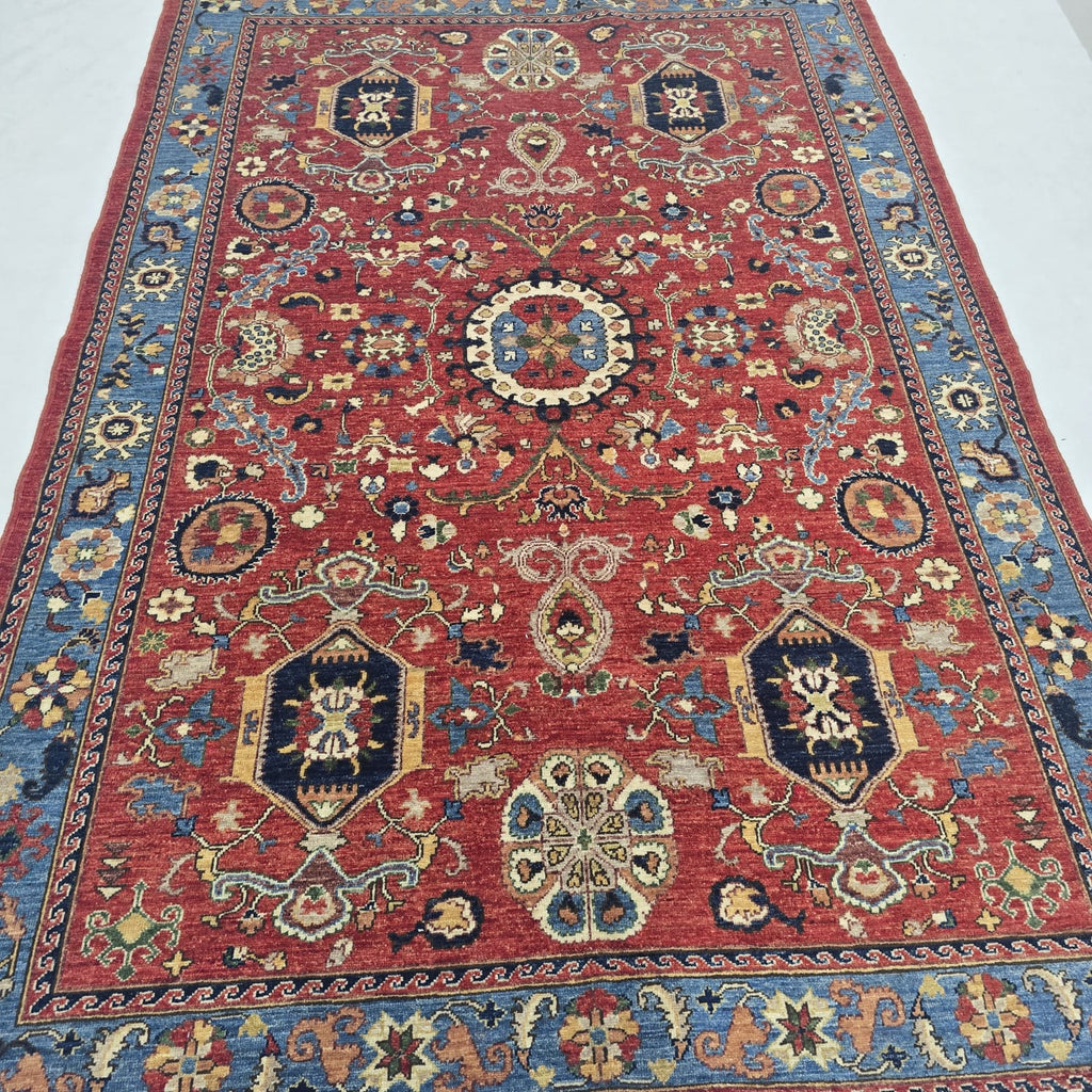 6x9 red Heriz floral handmade wool and cotton area rug with vegetable dyeing