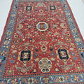 6x9 red Heriz floral handmade wool and cotton area rug with vegetable dyeing