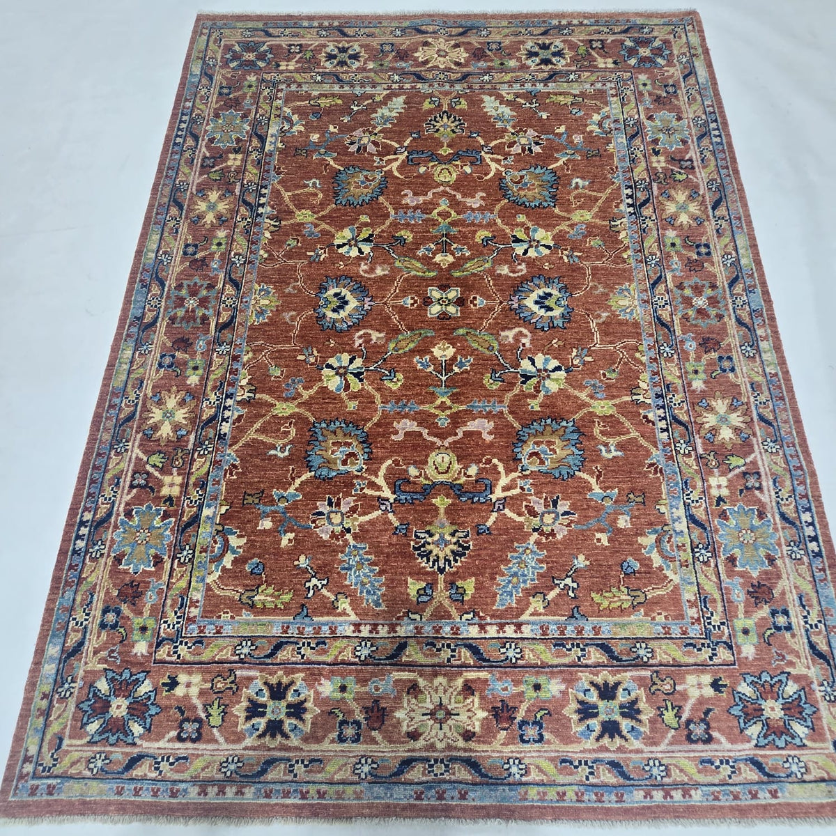 5x6.5 orange Chobi floral handmade wool and cotton area rug with vegetable dyeing