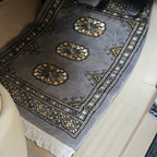 Gray artisan cotton wool car mat with geometric elephant foot pattern