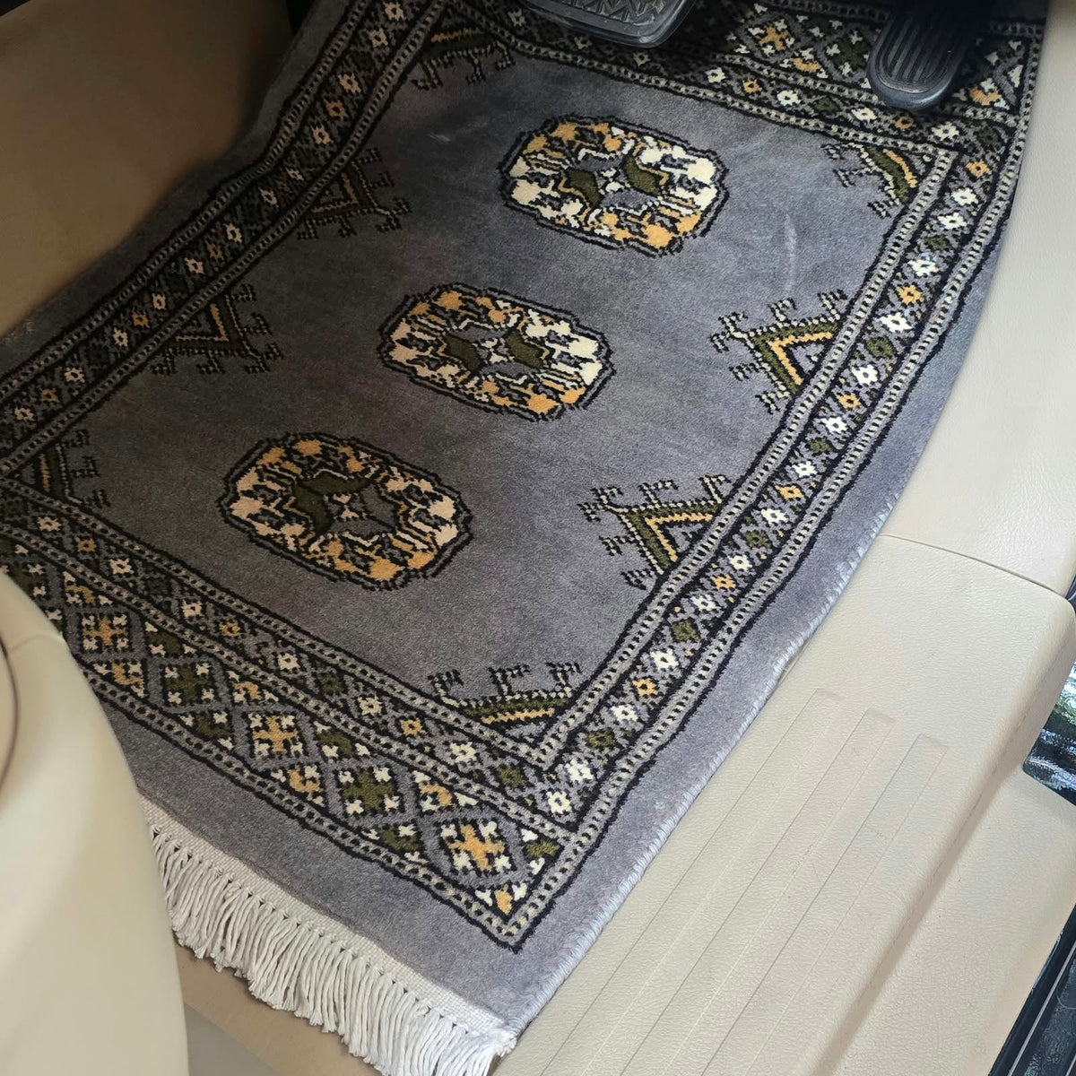 Gray artisan cotton wool car mat with geometric elephant foot pattern