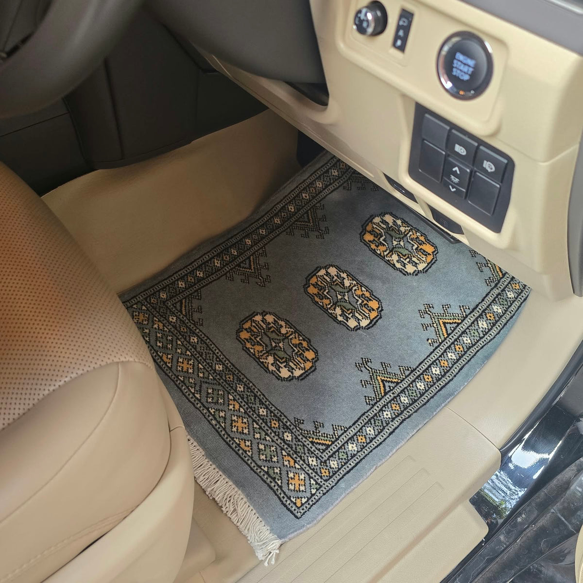 Gray handmade cotton wool car mat with geometric elephant foot pattern