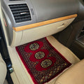 Ruby red cotton wool car mat with black and beige geometric elephant foot pattern
