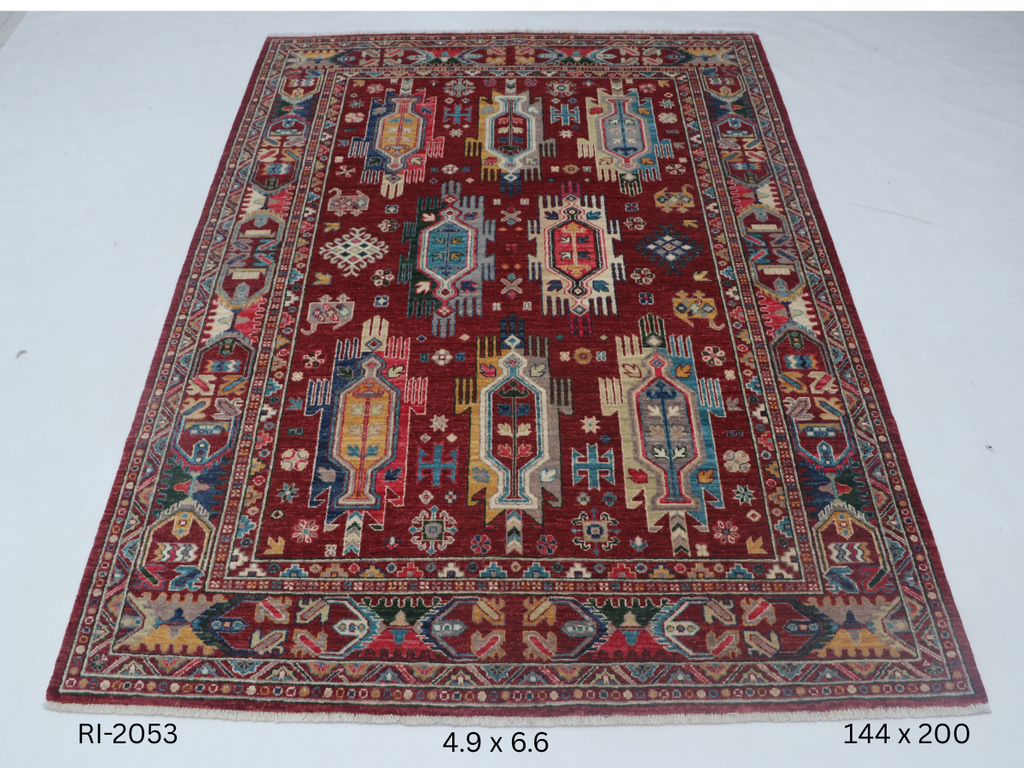 Red Chobi handmade floral cotton and wool rug

