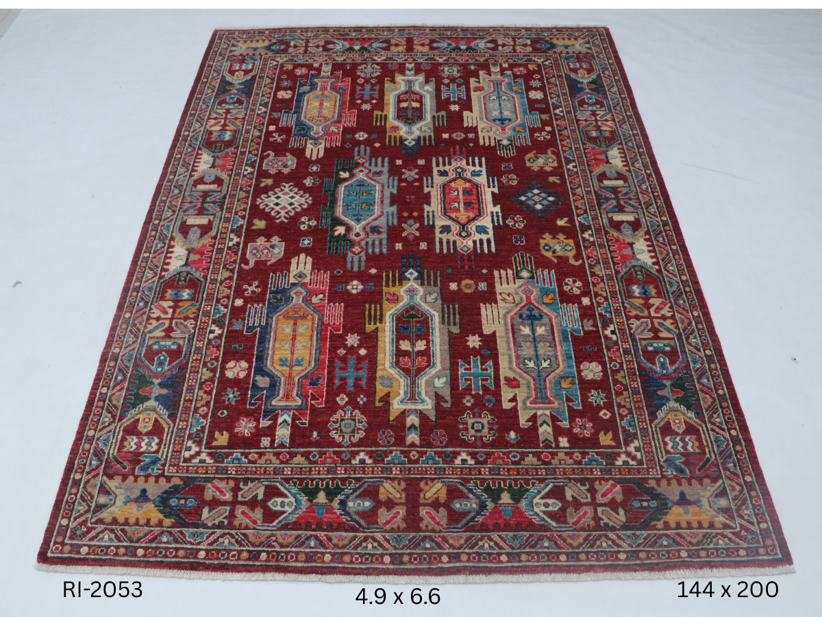 Red Chobi handmade floral cotton and wool rug
