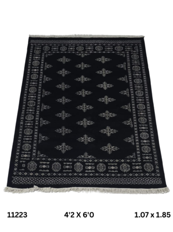 Handmade wool and cotton area rug or runner with repeated geometric Bokhara pattern displayed on floor