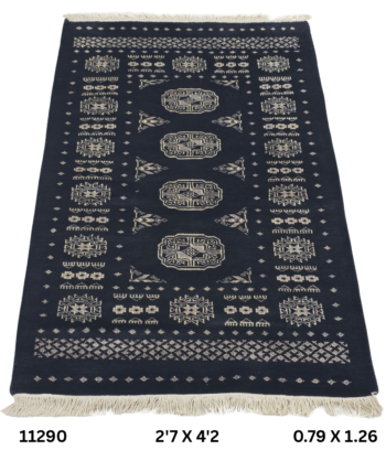 Handmade wool and cotton area rug or runner with repeated geometric Bokhara pattern displayed on floor
