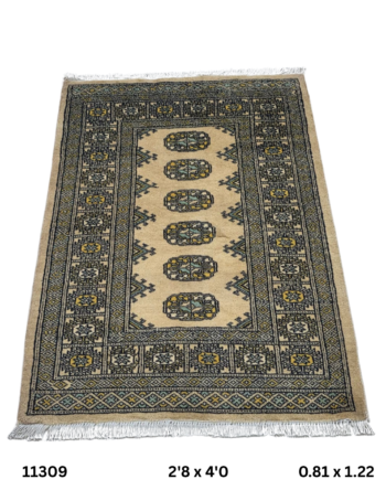 Handmade wool and cotton area rug or runner with repeated geometric Bokhara pattern displayed on floor