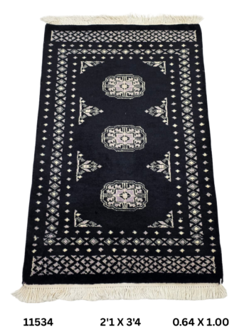 Handmade wool and cotton area rug or runner with repeated geometric Bokhara pattern displayed on floor