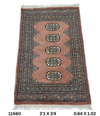 Handmade wool and cotton area rug or runner with repeated geometric Bokhara pattern displayed on floor