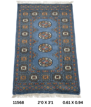 Handmade wool and cotton area rug or runner with repeated geometric Bokhara pattern displayed on floor