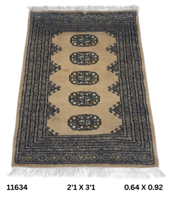 Handmade wool and cotton area rug or runner with repeated geometric Bokhara pattern displayed on floor