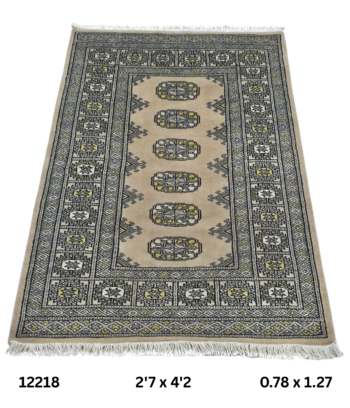 Handmade wool and cotton area rug or runner with repeated geometric Bokhara pattern displayed on floor