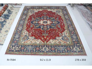 Handmade wool and cotton area rug or runner with classic floral Heriz pattern displayed on floor