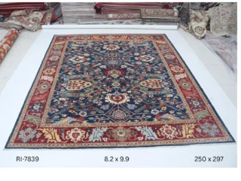 Handmade wool and cotton area rug or runner with classic floral Heriz pattern displayed on floor