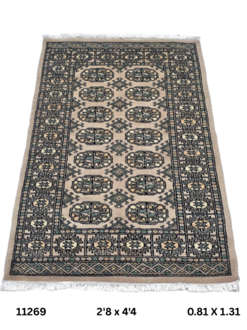 Handmade wool and cotton area rug or runner with repeated geometric Bokhara pattern displayed on floor