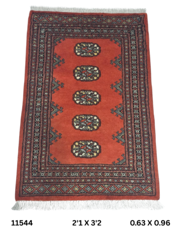 Handmade wool and cotton area rug or runner with repeated geometric Bokhara pattern displayed on floor