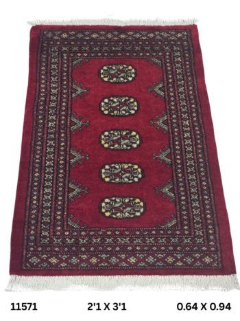 Handmade wool and cotton area rug or runner with repeated geometric Bokhara pattern displayed on floor