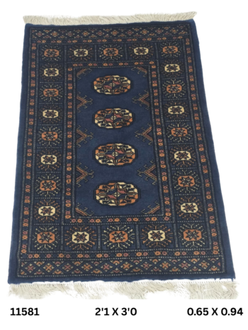 Handmade wool and cotton area rug or runner with repeated geometric Bokhara pattern displayed on floor