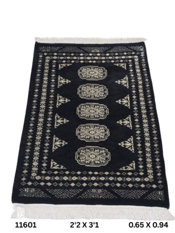 Handmade wool and cotton area rug or runner with repeated geometric Bokhara pattern displayed on floor