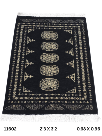 Handmade wool and cotton area rug or runner with repeated geometric Bokhara pattern displayed on floor