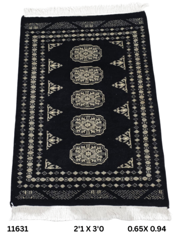 Handmade wool and cotton area rug or runner with repeated geometric Bokhara pattern displayed on floor