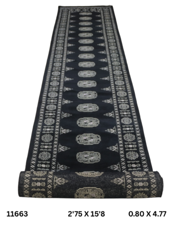 Handmade wool and cotton area rug or runner with repeated geometric Bokhara pattern displayed on floor
