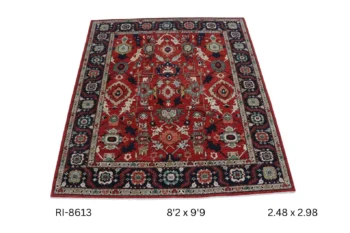 Handmade wool and cotton area rug or runner with classic floral Heriz pattern displayed on floor