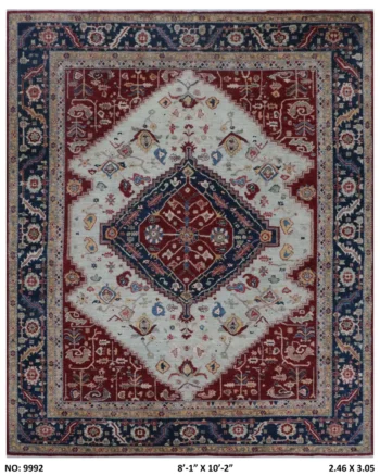 Handmade wool and cotton area rug or runner with classic floral Heriz pattern displayed on floor